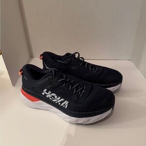 Hoka Navy Blue and White Running Shoes with Orange Detail